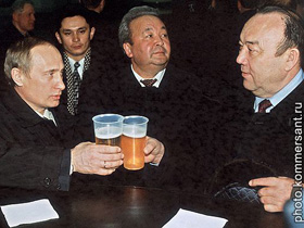 Владимир Путин и Муртаза Рахимов. Фото с сайта "Коммерсант" (с) Владимир Путин и Муртаза Рахимов. Фото с сайта "Коммерсант" (с)