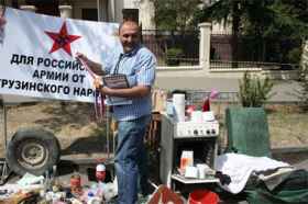 Акция гуманитарной помощи для мародеров, Грузия. Фото с сайта http://www.kavkazcenter.com/ Акция гуманитарной помощи для мародеров, Грузия. Фото с сайта http://www.kavkazcenter.com/