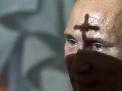 Митра патриарха отбрасывает тень на Путина. Фото - Reuters, источник - http://www.unian.ua/multimedia/photo/10727-ot-efiopii-do-kieva-pasha-v-mire.html Митра патриарха отбрасывает тень на Путина. Фото - Reuters, источник - http://www.unian.ua/multimedia/photo/10727-ot-efiopii-do-kieva-pasha-v-mire.html