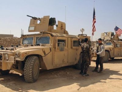 Военная техника под флагами США в Сирии. Источник - elperiodico.com Военная техника под флагами США в Сирии. Источник - elperiodico.com