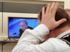 Телевизор и выступление Путина. Фото: www.facebook.com/profile.php?id=100010560969309 Телевизор и выступление Путина. Фото: www.facebook.com/profile.php?id=100010560969309