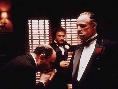 Фильм Крестный отец": целовение перстня. Скрин: film.ru Фильм Крестный отец": целовение перстня. Скрин: film.ru