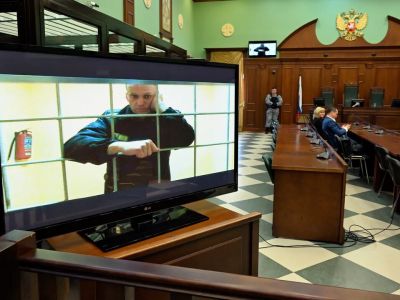 Алексей Навальный во время заседания суда в режиме видеоконференции. Фото: Александр Миридонов / Коммерсант Алексей Навальный во время заседания суда в режиме видеоконференции. Фото: Александр Миридонов / Коммерсант