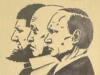 Кадыров, Пригожин, Путин. Граффити на мосту им. Кадырова в Санкт-Петербурге. Фото: SOTA Кадыров, Пригожин, Путин. Граффити на мосту им. Кадырова в Санкт-Петербурге. Фото: SOTA